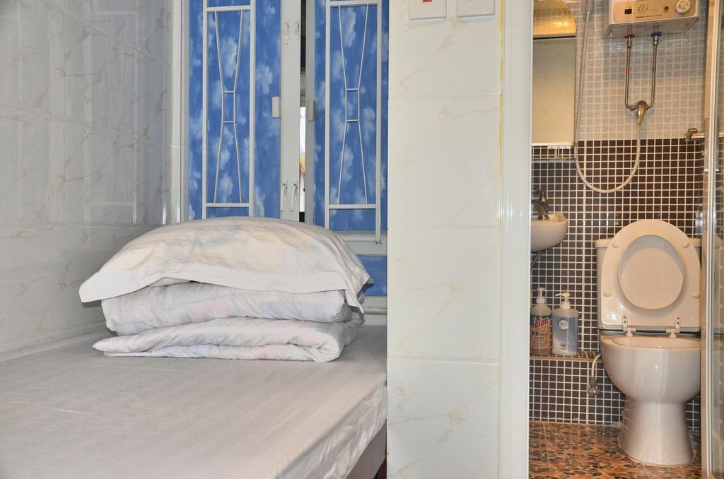 هونغ كونغ Xing Xing Hostel الغرفة الصورة